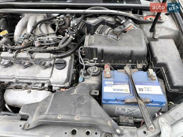 Сірий Тойота Камрі, об'ємом двигуна 3 л та пробігом 284 тис. км за 5700 $, фото 26 на Automoto.ua