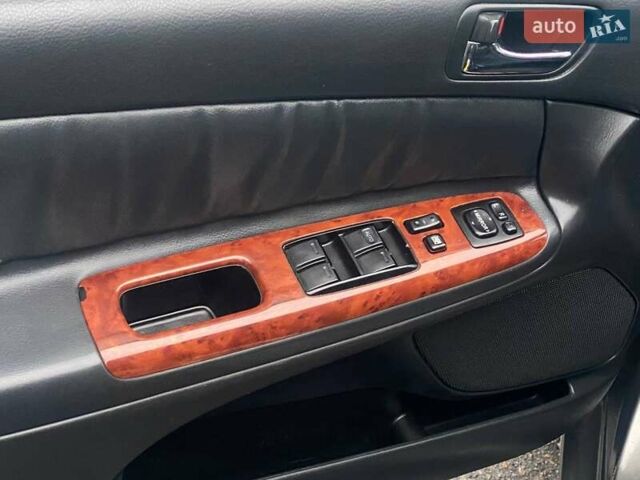 Серый Тойота Камри, объемом двигателя 2.4 л и пробегом 270 тыс. км за 5600 $, фото 13 на Automoto.ua