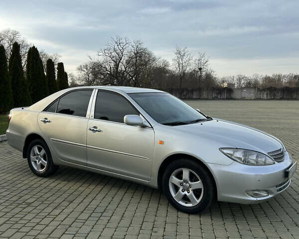 Серый Тойота Камри, объемом двигателя 3 л и пробегом 255 тыс. км за 6800 $, фото 3 на Automoto.ua