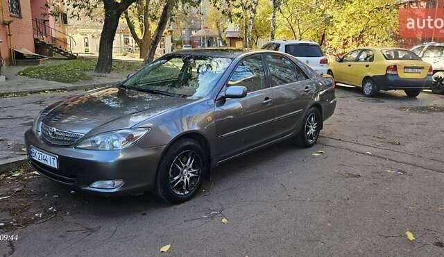 Серый Тойота Камри, объемом двигателя 3 л и пробегом 210 тыс. км за 4800 $, фото 14 на Automoto.ua