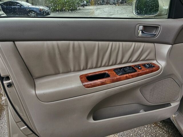 Серый Тойота Камри, объемом двигателя 3 л и пробегом 200 тыс. км за 3700 $, фото 22 на Automoto.ua