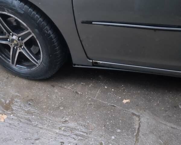 Серый Тойота Камри, объемом двигателя 2.4 л и пробегом 250 тыс. км за 4500 $, фото 6 на Automoto.ua