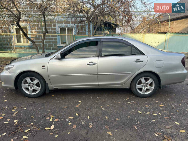 Сірий Тойота Камрі, об'ємом двигуна 2.36 л та пробігом 380 тис. км за 4500 $, фото 2 на Automoto.ua