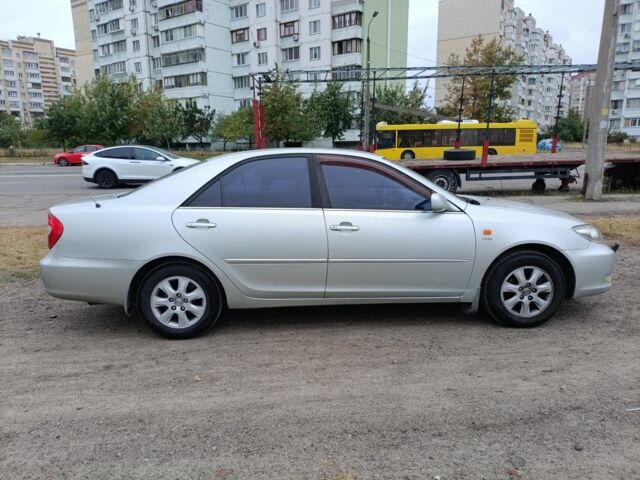 Серый Тойота Камри, объемом двигателя 2.4 л и пробегом 390 тыс. км за 5000 $, фото 2 на Automoto.ua