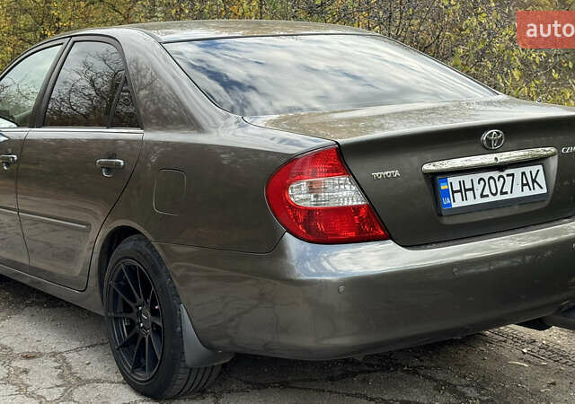 Серый Тойота Камри, объемом двигателя 3 л и пробегом 417 тыс. км за 8000 $, фото 4 на Automoto.ua