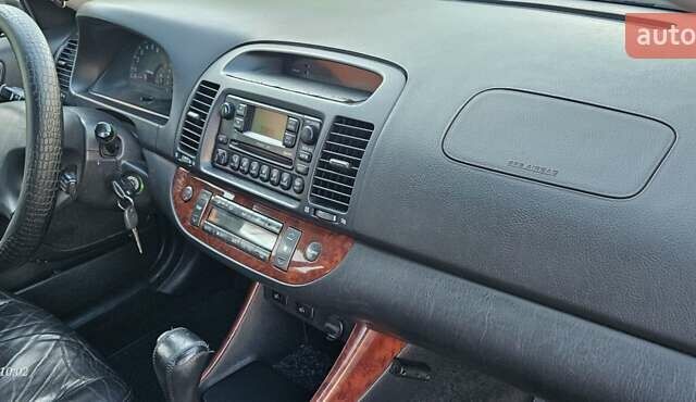 Серый Тойота Камри, объемом двигателя 3 л и пробегом 210 тыс. км за 4800 $, фото 5 на Automoto.ua