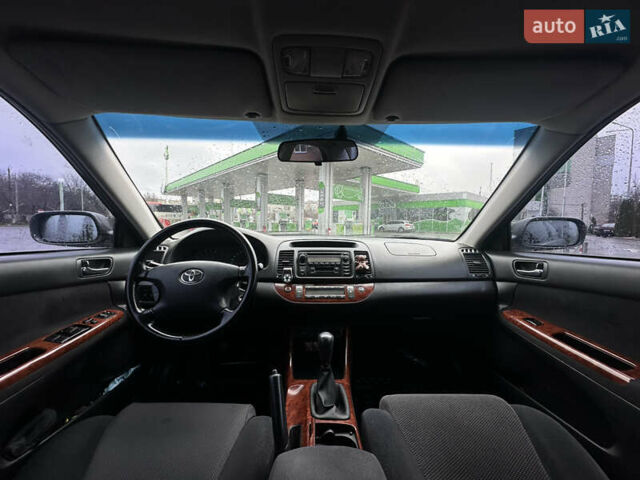 Серый Тойота Камри, объемом двигателя 2.36 л и пробегом 617 тыс. км за 5700 $, фото 21 на Automoto.ua