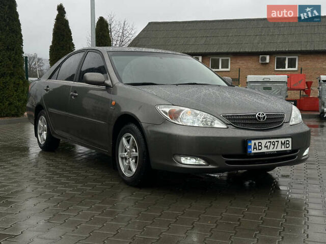 Серый Тойота Камри, объемом двигателя 2.36 л и пробегом 617 тыс. км за 5700 $, фото 2 на Automoto.ua