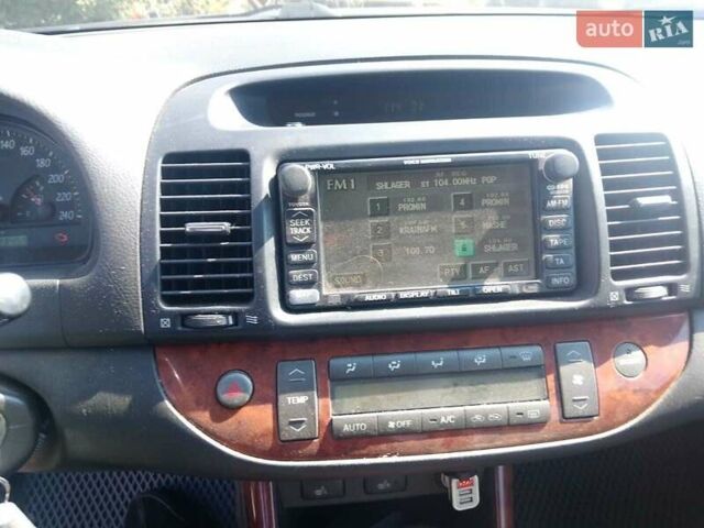 Серый Тойота Камри, объемом двигателя 2.4 л и пробегом 323 тыс. км за 5200 $, фото 8 на Automoto.ua