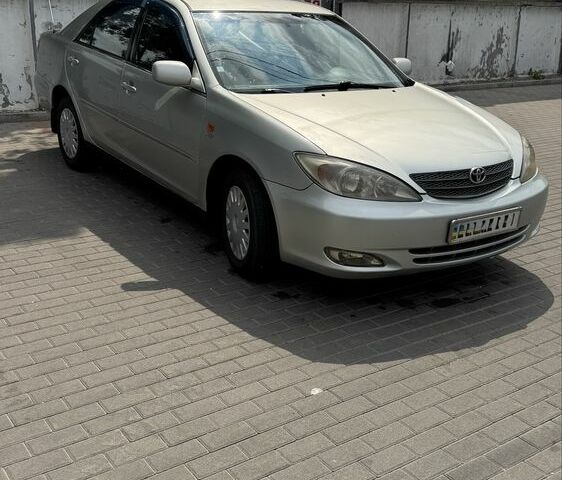 Сірий Тойота Камрі, об'ємом двигуна 2.4 л та пробігом 300 тис. км за 4600 $, фото 1 на Automoto.ua