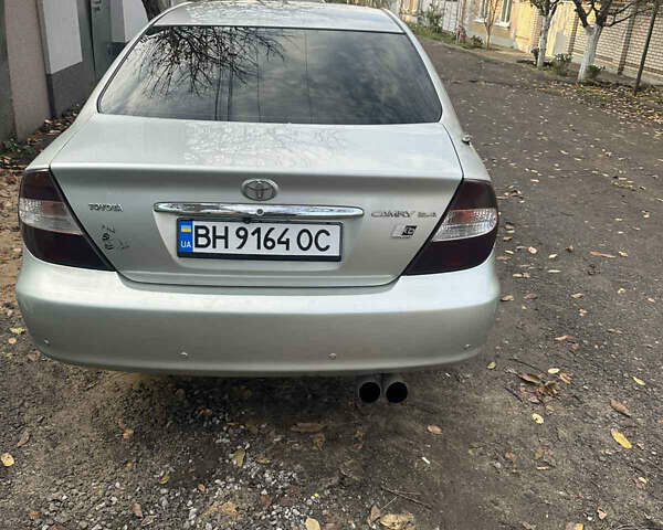 Сірий Тойота Камрі, об'ємом двигуна 2.36 л та пробігом 380 тис. км за 4500 $, фото 1 на Automoto.ua