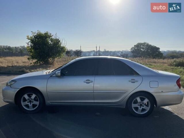 Сірий Тойота Камрі, об'ємом двигуна 3 л та пробігом 145 тис. км за 4000 $, фото 4 на Automoto.ua