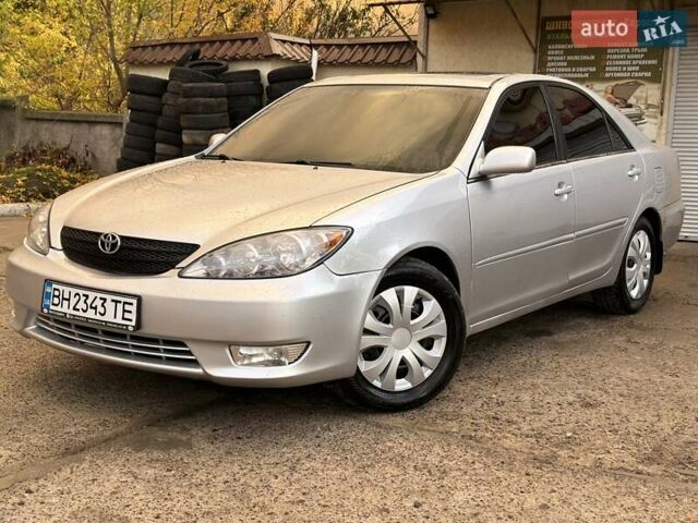 Серый Тойота Камри, объемом двигателя 2.36 л и пробегом 300 тыс. км за 5200 $, фото 16 на Automoto.ua