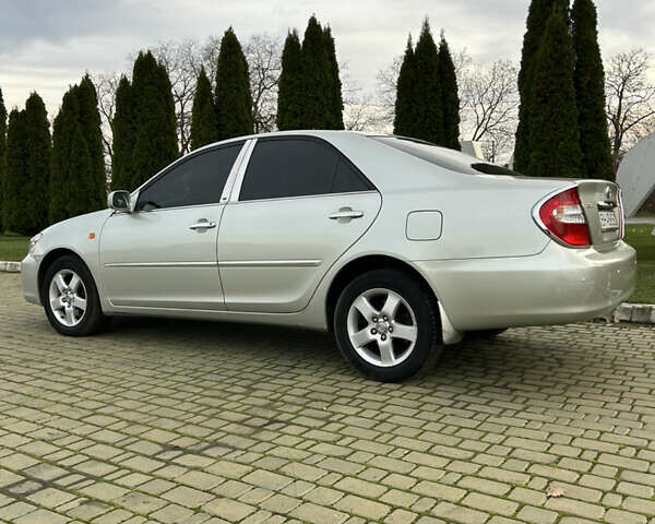 Серый Тойота Камри, объемом двигателя 3 л и пробегом 255 тыс. км за 6800 $, фото 29 на Automoto.ua