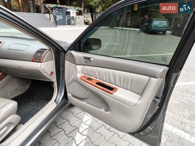 Сірий Тойота Камрі, об'ємом двигуна 3 л та пробігом 284 тис. км за 5700 $, фото 28 на Automoto.ua