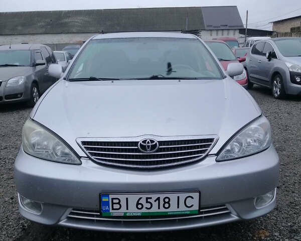 Серый Тойота Камри, объемом двигателя 2.4 л и пробегом 280 тыс. км за 4850 $, фото 2 на Automoto.ua