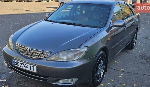 Серый Тойота Камри, объемом двигателя 3 л и пробегом 210 тыс. км за 4800 $, фото 10 на Automoto.ua