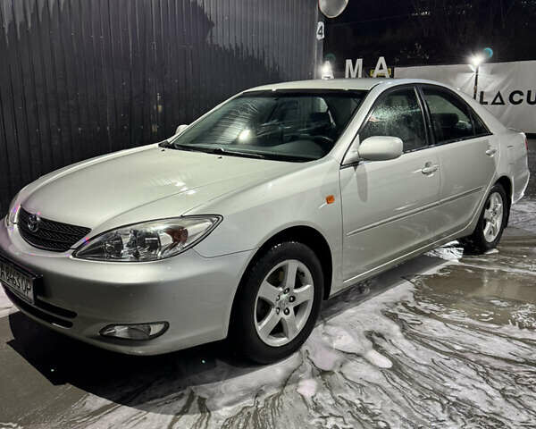 Серый Тойота Камри, объемом двигателя 2.4 л и пробегом 101 тыс. км за 7500 $, фото 16 на Automoto.ua