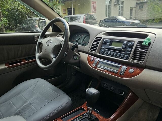 Серый Тойота Камри, объемом двигателя 3 л и пробегом 200 тыс. км за 3700 $, фото 10 на Automoto.ua