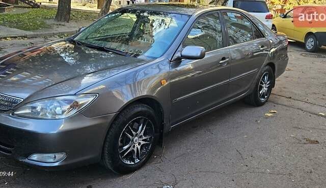 Серый Тойота Камри, объемом двигателя 3 л и пробегом 210 тыс. км за 4800 $, фото 15 на Automoto.ua