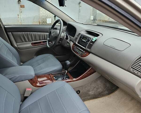 Серый Тойота Камри, объемом двигателя 3 л и пробегом 330 тыс. км за 3100 $, фото 12 на Automoto.ua