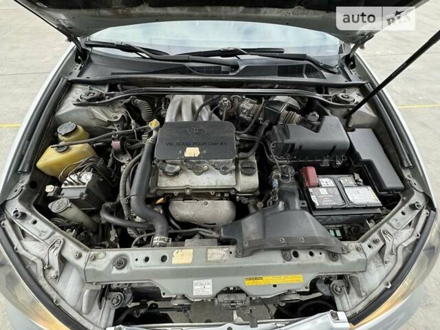Сірий Тойота Камрі, об'ємом двигуна 3 л та пробігом 223 тис. км за 5999 $, фото 26 на Automoto.ua