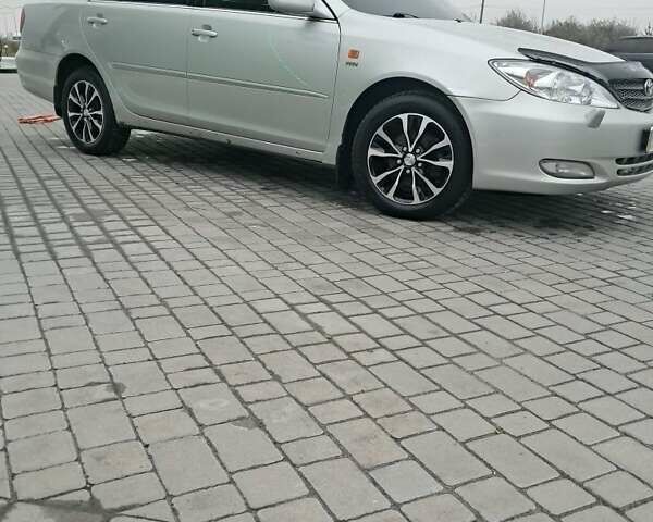 Серый Тойота Камри, объемом двигателя 2.4 л и пробегом 365 тыс. км за 5700 $, фото 4 на Automoto.ua