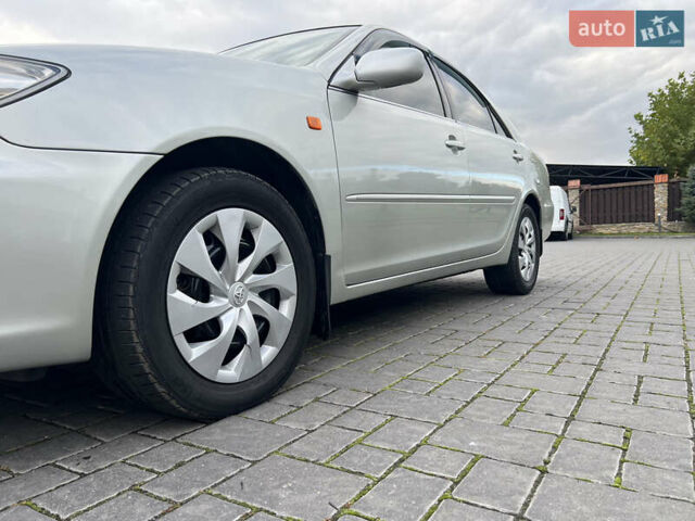 Сірий Тойота Камрі, об'ємом двигуна 3 л та пробігом 221 тис. км за 6300 $, фото 4 на Automoto.ua