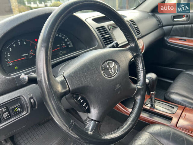 Сірий Тойота Камрі, об'ємом двигуна 3 л та пробігом 221 тис. км за 6300 $, фото 26 на Automoto.ua