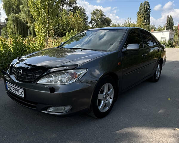 Серый Тойота Камри, объемом двигателя 3 л и пробегом 390 тыс. км за 6200 $, фото 1 на Automoto.ua