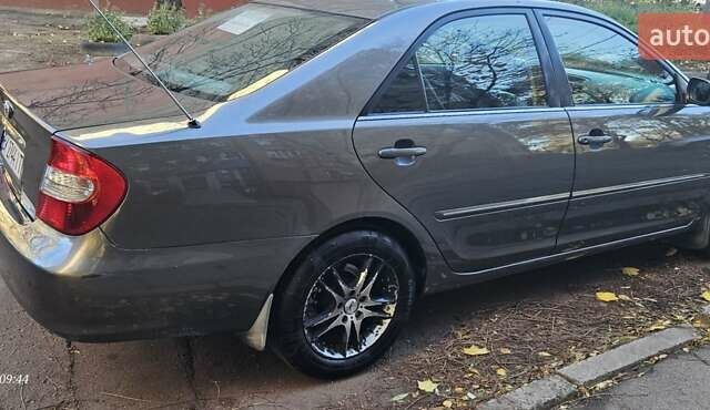 Серый Тойота Камри, объемом двигателя 3 л и пробегом 210 тыс. км за 4800 $, фото 13 на Automoto.ua