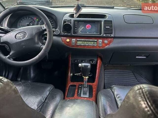 Сірий Тойота Камрі, об'ємом двигуна 2.36 л та пробігом 380 тис. км за 4500 $, фото 4 на Automoto.ua