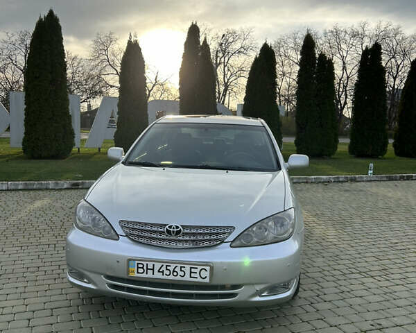 Серый Тойота Камри, объемом двигателя 3 л и пробегом 255 тыс. км за 6800 $, фото 1 на Automoto.ua