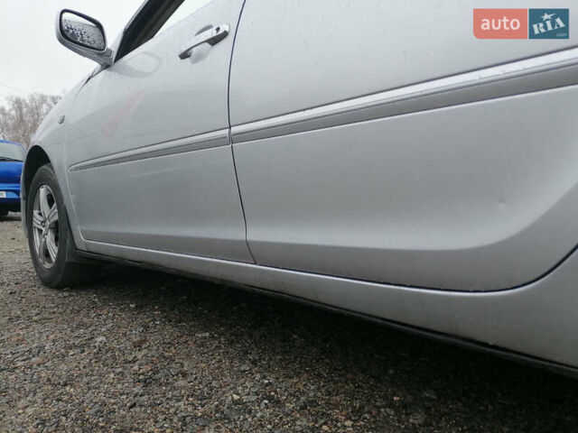 Серый Тойота Камри, объемом двигателя 2.4 л и пробегом 280 тыс. км за 4850 $, фото 12 на Automoto.ua