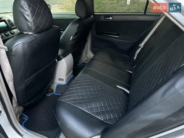 Серый Тойота Камри, объемом двигателя 2.36 л и пробегом 300 тыс. км за 5200 $, фото 26 на Automoto.ua