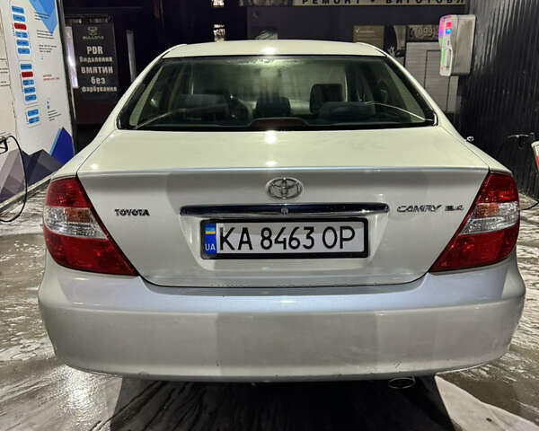 Серый Тойота Камри, объемом двигателя 2.4 л и пробегом 101 тыс. км за 7500 $, фото 1 на Automoto.ua