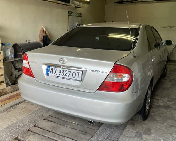 Серый Тойота Камри, объемом двигателя 2.4 л и пробегом 400 тыс. км за 5300 $, фото 2 на Automoto.ua