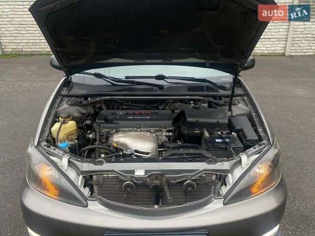 Серый Тойота Камри, объемом двигателя 2.4 л и пробегом 270 тыс. км за 5600 $, фото 16 на Automoto.ua