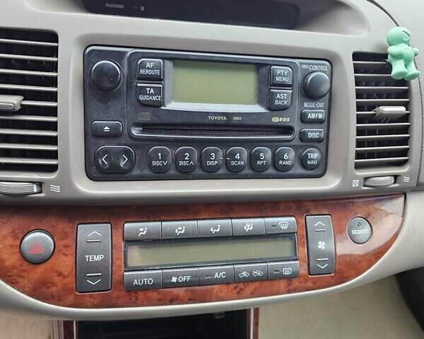 Серый Тойота Камри, объемом двигателя 3 л и пробегом 330 тыс. км за 3100 $, фото 23 на Automoto.ua