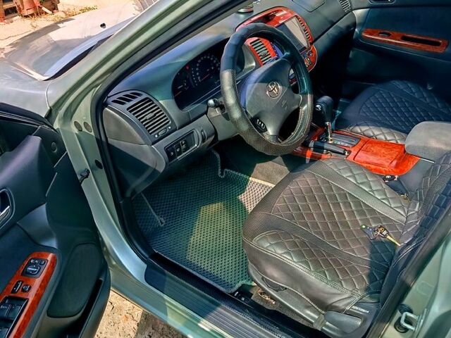 Сірий Тойота Камрі, об'ємом двигуна 2.4 л та пробігом 260 тис. км за 5500 $, фото 6 на Automoto.ua