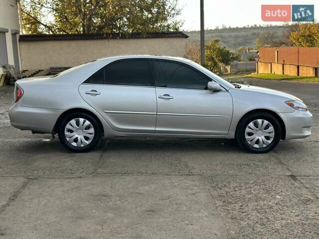 Серый Тойота Камри, объемом двигателя 2.36 л и пробегом 300 тыс. км за 5200 $, фото 8 на Automoto.ua