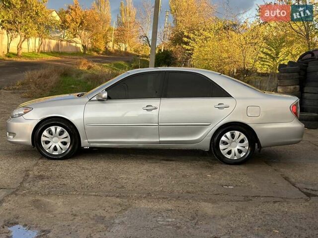 Серый Тойота Камри, объемом двигателя 2.36 л и пробегом 300 тыс. км за 5200 $, фото 14 на Automoto.ua