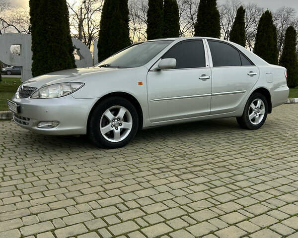 Серый Тойота Камри, объемом двигателя 3 л и пробегом 255 тыс. км за 6800 $, фото 26 на Automoto.ua