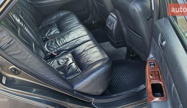 Серый Тойота Камри, объемом двигателя 3 л и пробегом 210 тыс. км за 4800 $, фото 3 на Automoto.ua