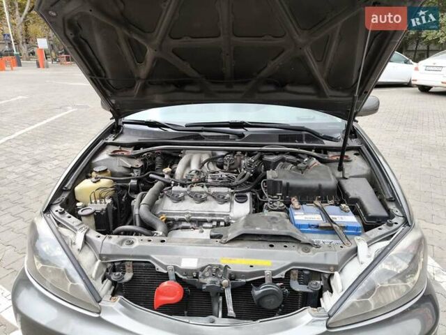 Сірий Тойота Камрі, об'ємом двигуна 3 л та пробігом 284 тис. км за 5700 $, фото 29 на Automoto.ua