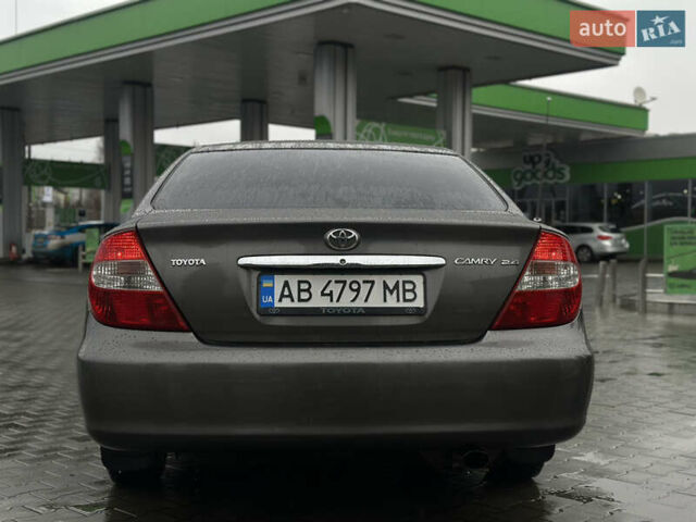 Серый Тойота Камри, объемом двигателя 2.36 л и пробегом 617 тыс. км за 5700 $, фото 5 на Automoto.ua
