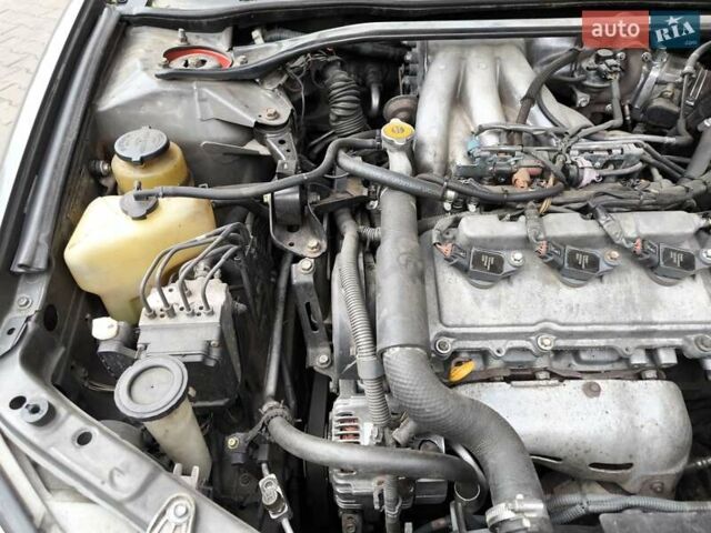 Сірий Тойота Камрі, об'ємом двигуна 3 л та пробігом 284 тис. км за 5700 $, фото 24 на Automoto.ua