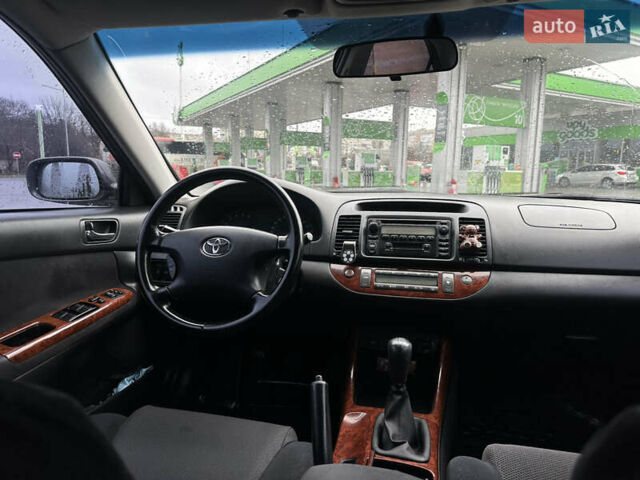 Серый Тойота Камри, объемом двигателя 2.36 л и пробегом 617 тыс. км за 5700 $, фото 19 на Automoto.ua