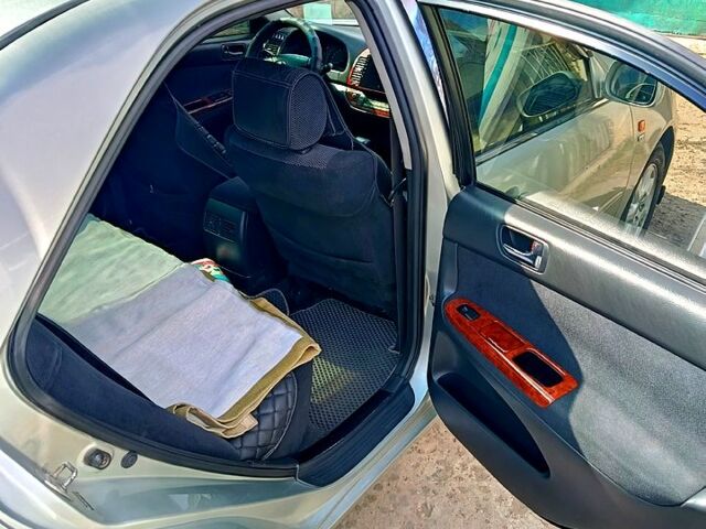 Сірий Тойота Камрі, об'ємом двигуна 2.4 л та пробігом 260 тис. км за 5500 $, фото 7 на Automoto.ua