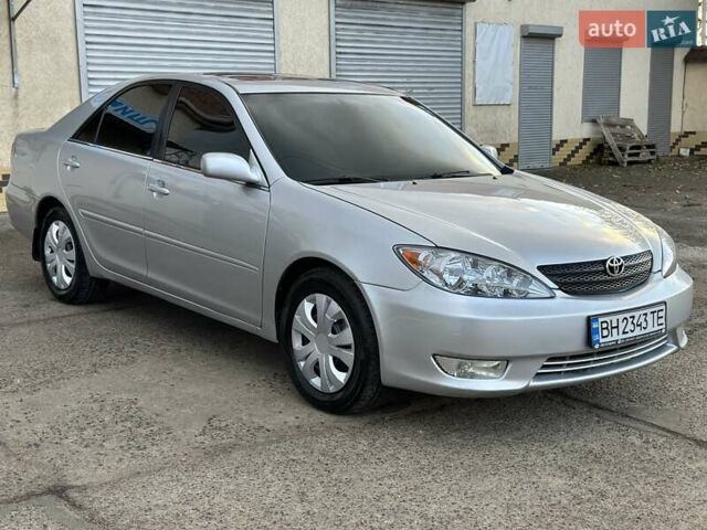 Серый Тойота Камри, объемом двигателя 2.36 л и пробегом 300 тыс. км за 5200 $, фото 4 на Automoto.ua